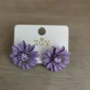 Brincos de flores roxas